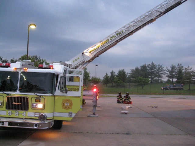 MCFA Live Burn 05/08 - District 9 Truck 9-2-4 ladders the building